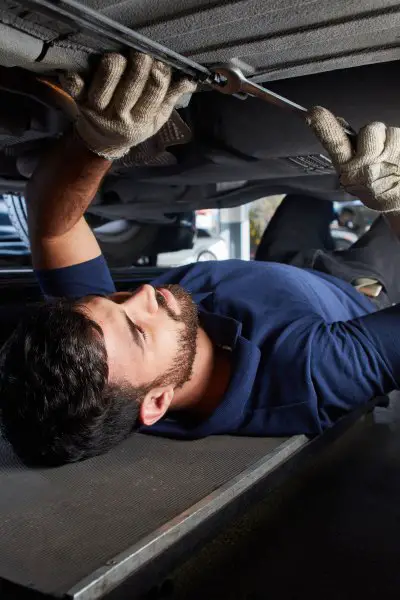 Mechanic checks car