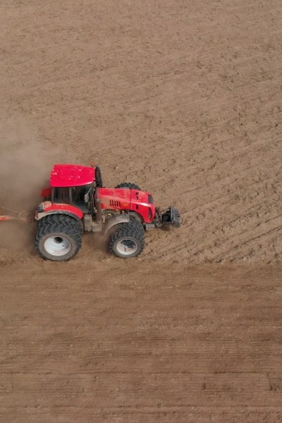 Tractor Plowing the Field