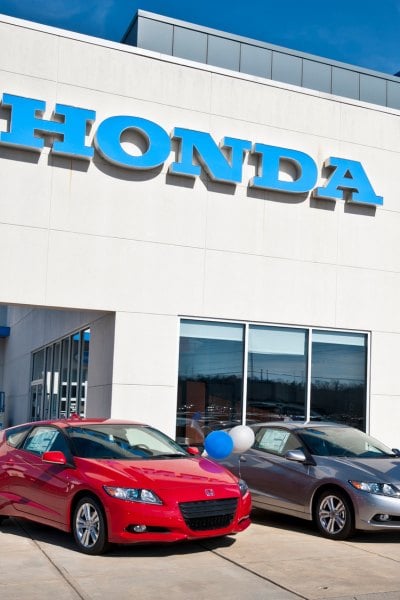 Honda dealership with cars in front